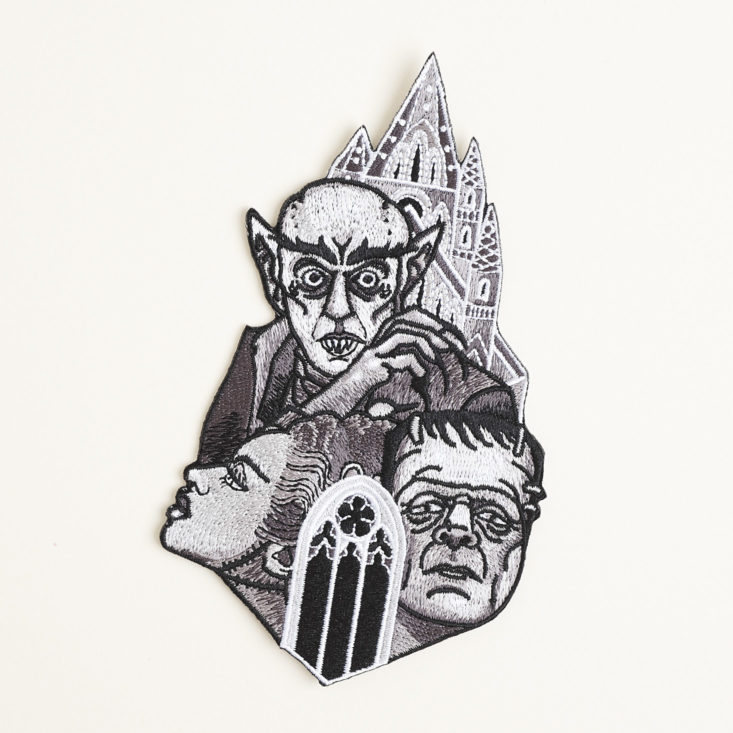 Classic Monsters patch featuring Nosferatu, Frankenstein, and the Bride of Frankenstein in front of a gothic castle