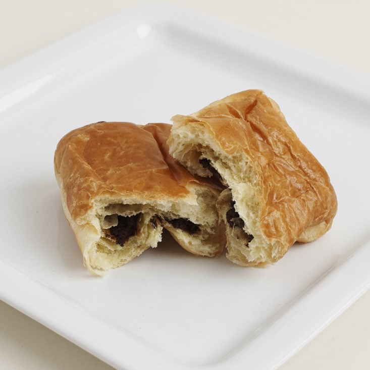 Chocolate croissant on a plate by brioche pasquier