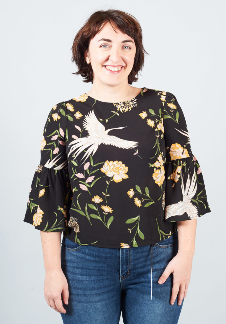 crane-printed bell-sleeve top