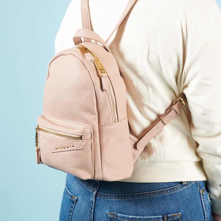 beige faux leather mini backpack on