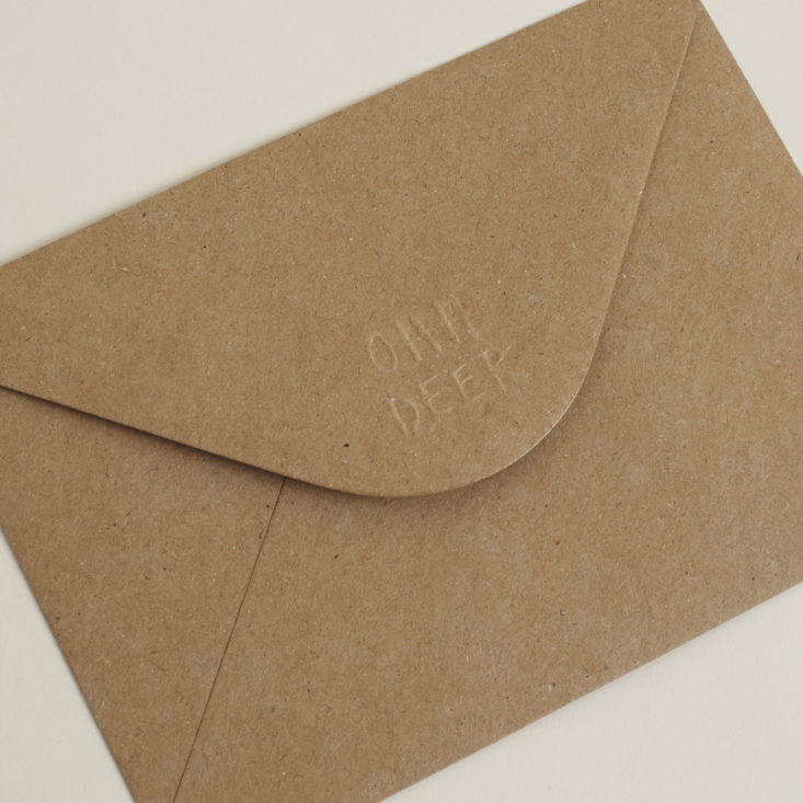 close up of kraft paper envelope with Ohh Deer branding