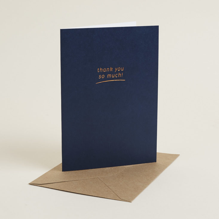 navy blue greeting card that says "thank you so much!"