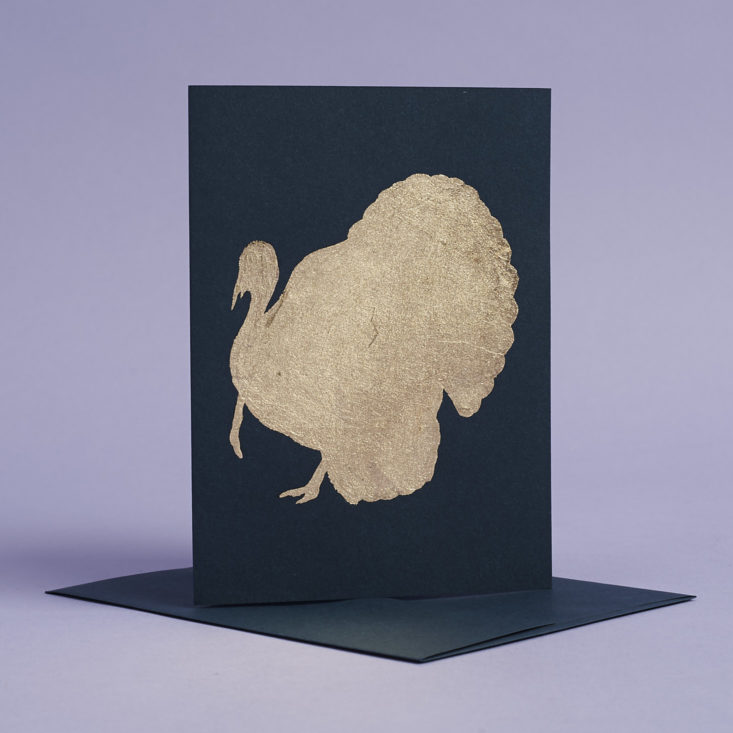 gold turkey on navy blue greeting card