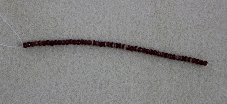 small brown beads on a string