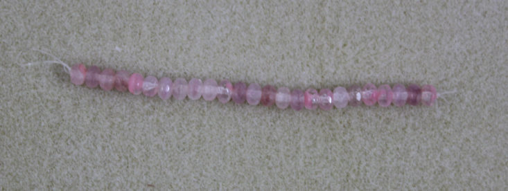 crystal pink beads on a thread