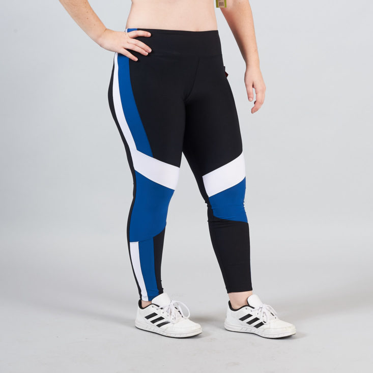 blue and black leggings on model