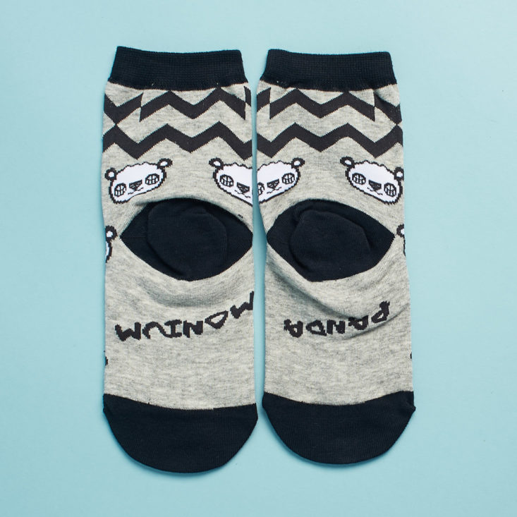 "Panda Monium" text on sock soles