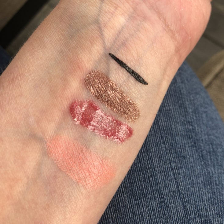 swatches of makeup on a wrist