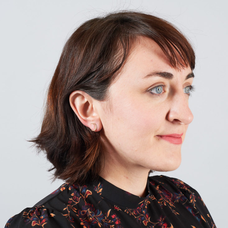 small moon earrings on model