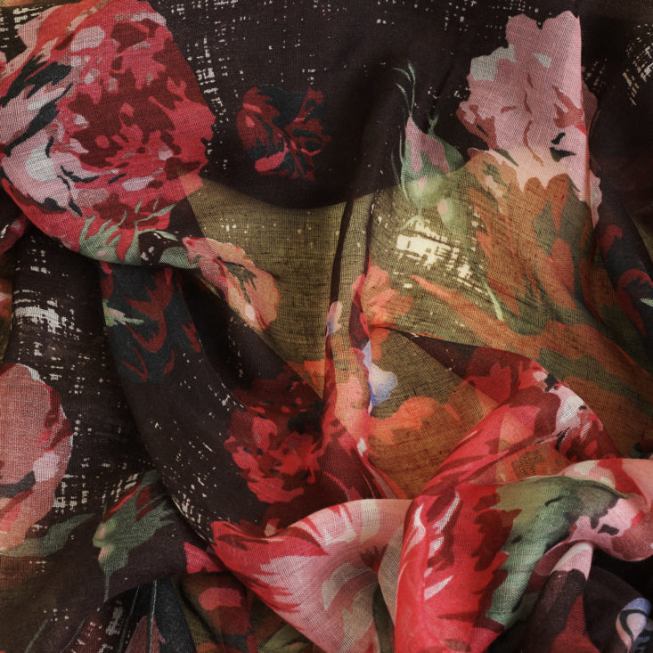 close up of black and pink light floral scarf