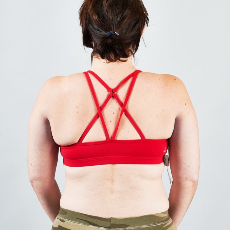 back of a bright red sports bra