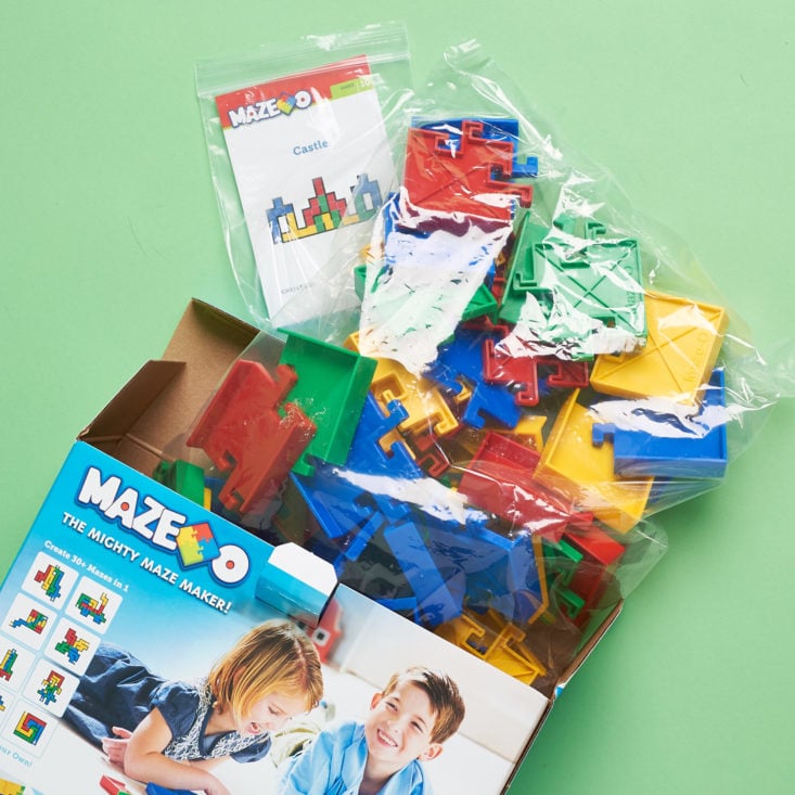 Contents inside: Maze building pieces and instructions