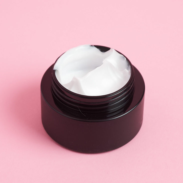 lotion inside black pot