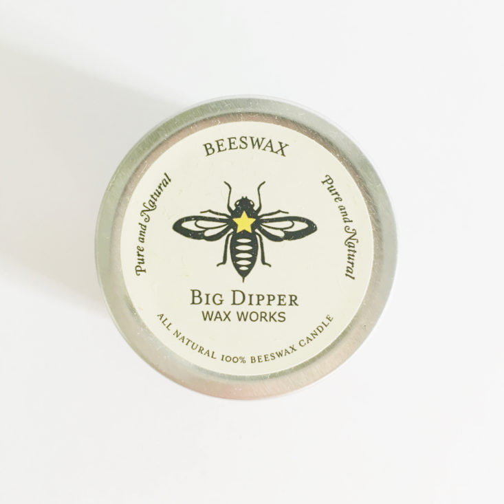 beeswax candle in a travel tin