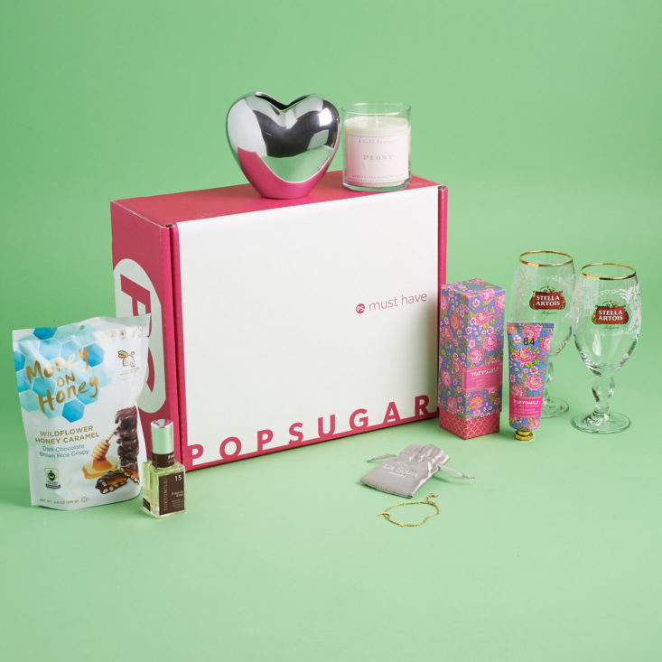 popsugar box and contents including glasses decor and beauty products