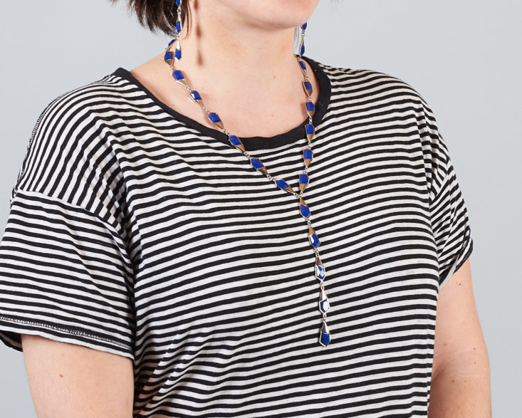 blue fragment necklace on woman