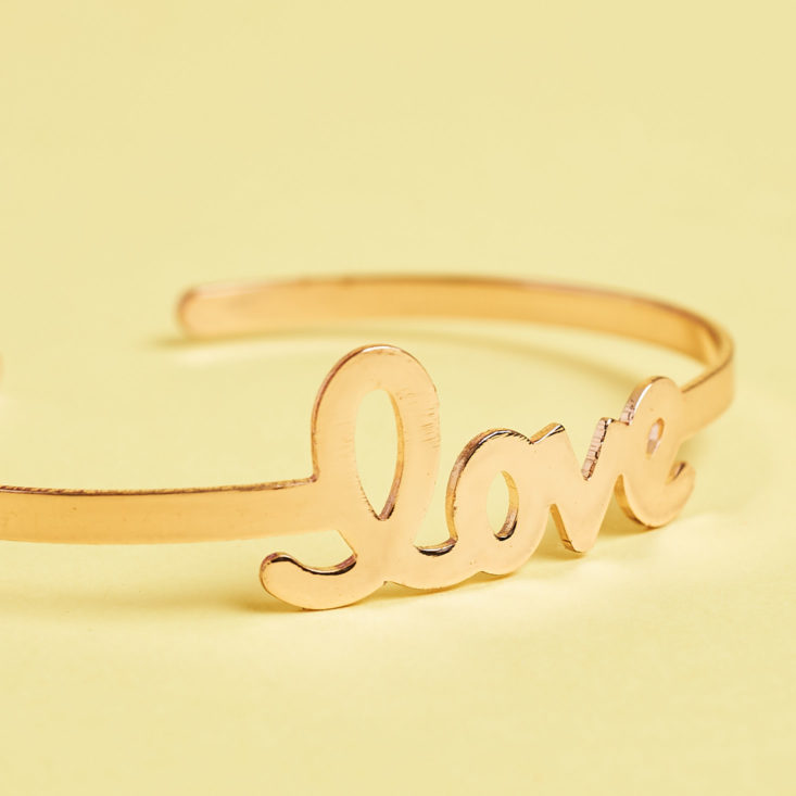 gold cuff bracelet that says love