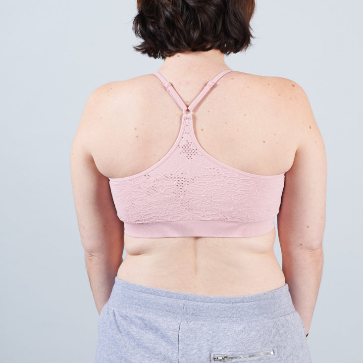 back of pink sports bra
