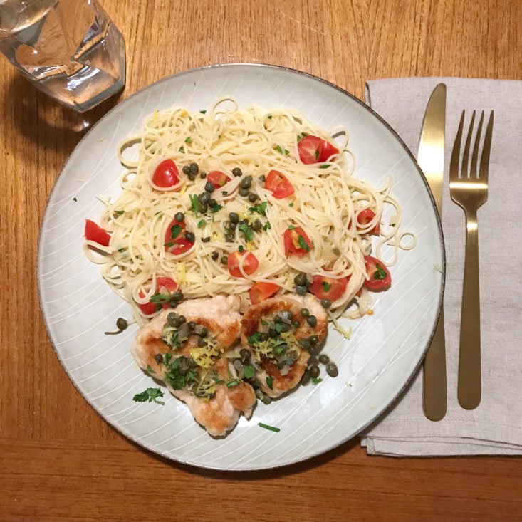 plated chicken piccata with angel hair pasta