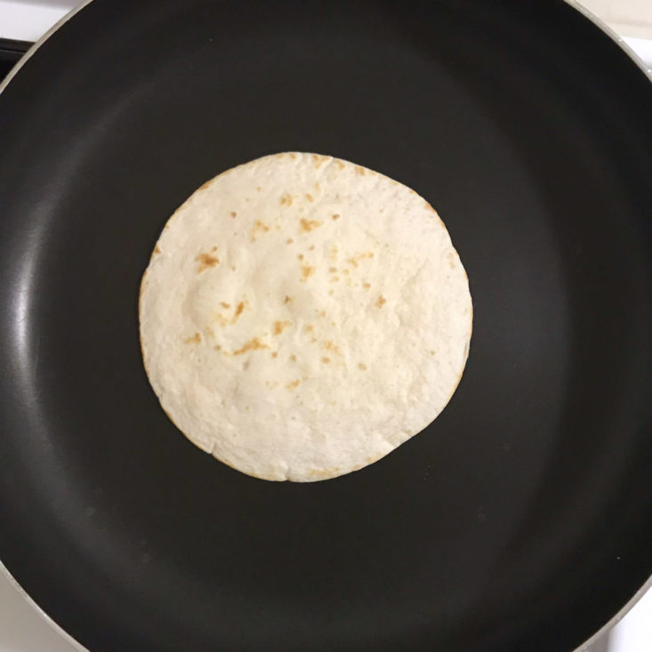tortilla warming in pan
