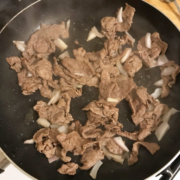 steak strips cooking with shallot