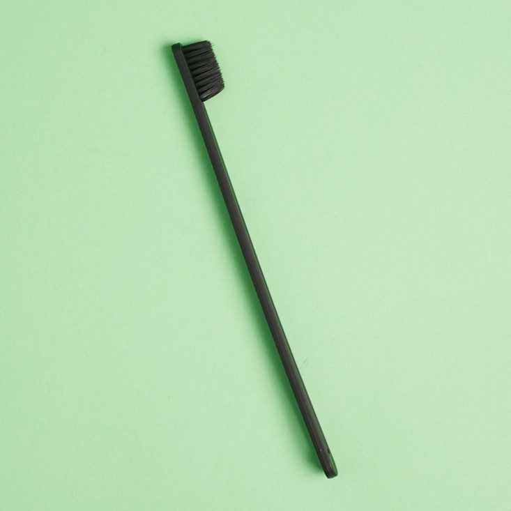 black toothbrush from the side