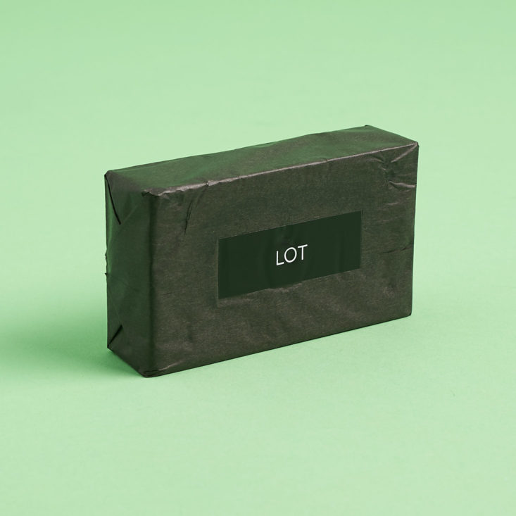 lot soap wrapped in black paper