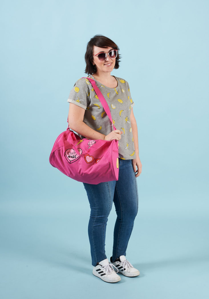 quirky crate bag and glasses on model