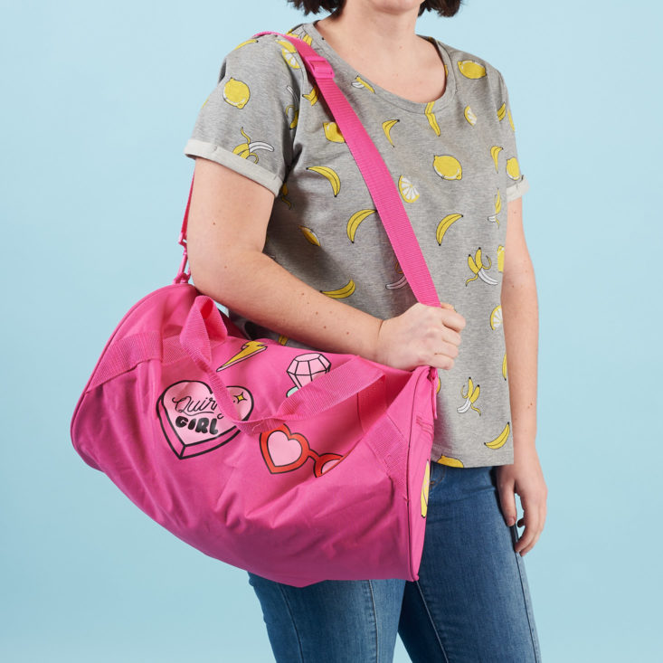 quirky crate pink bag on model