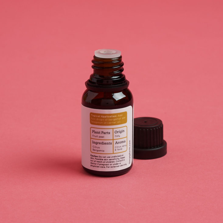 Bergamot Essential Oil bottle with the lid off