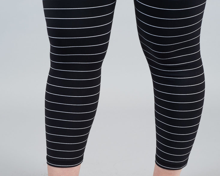 black and white striped leggings close up