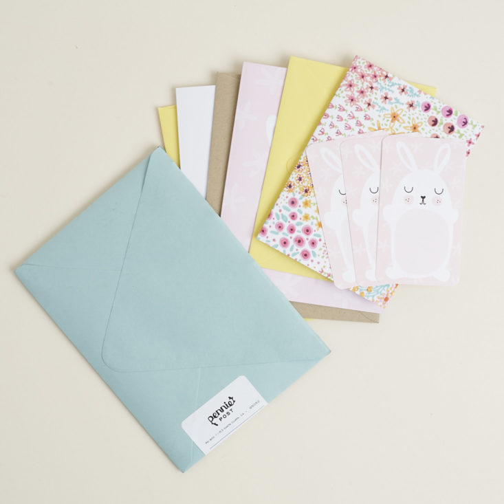 Pennie Post envelope with cards coming out