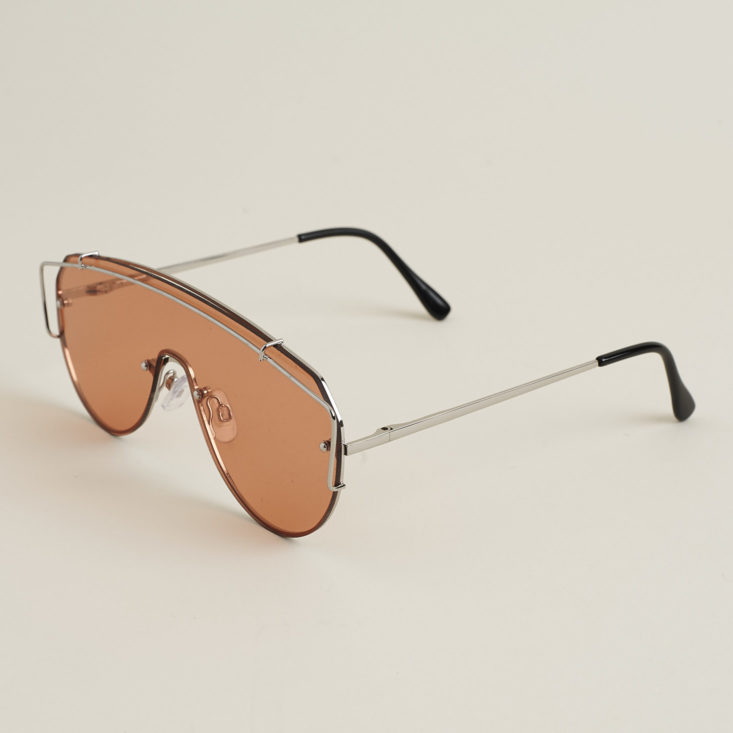 other side of "Runner" sunglasses with flat rose colored lenses