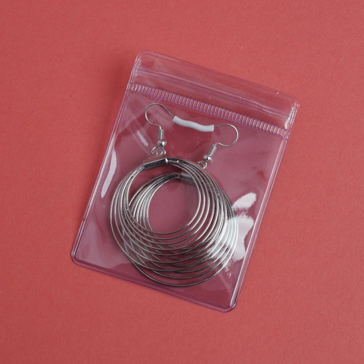 Silver Metallic Orbit earrings in pouch