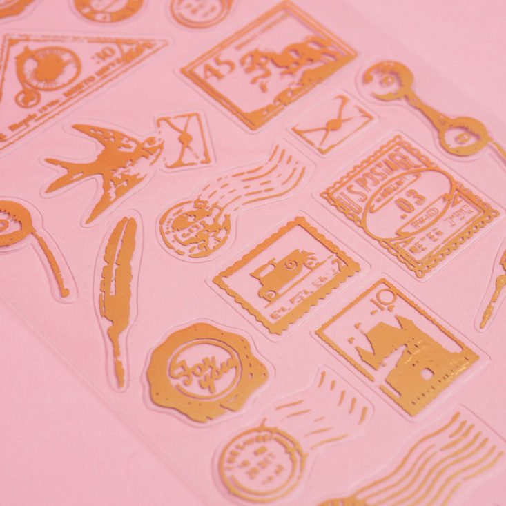 close up on gold shiny stamp stickers