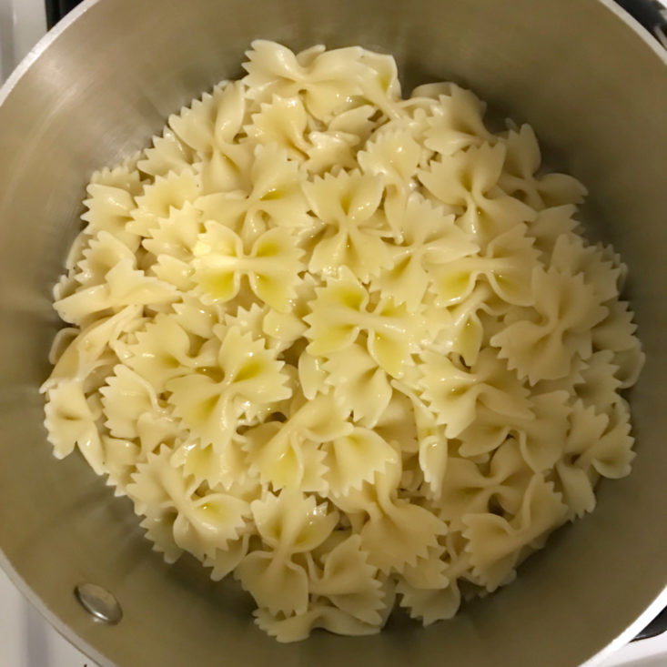 cooked pasta with olive oil in pot