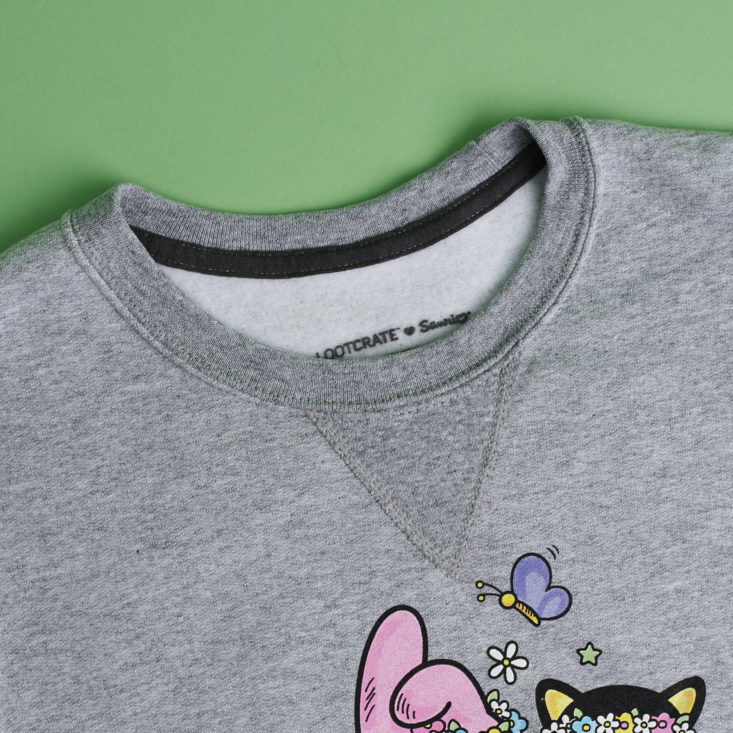 sanrio small gift crate spring box neck detail of gray sweatshirt