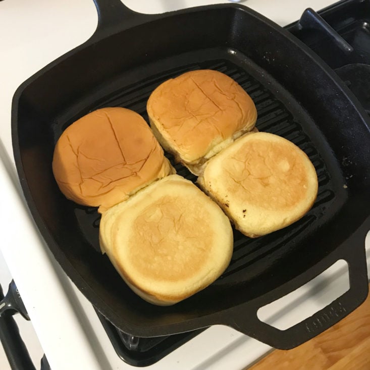 buns warming on grill pan