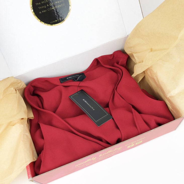 red dress folded inside the Luxe Catch box