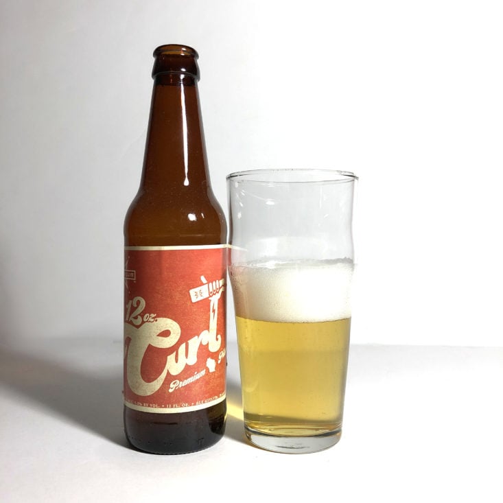 Microbrewed Beer of the Month July 2018 - 12 oz curl poured