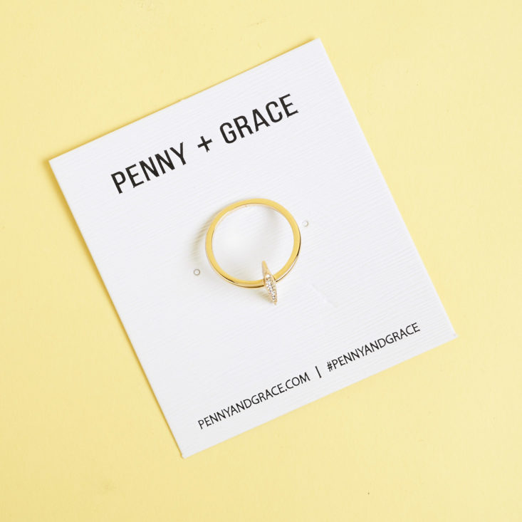 penny and grace ring on backing