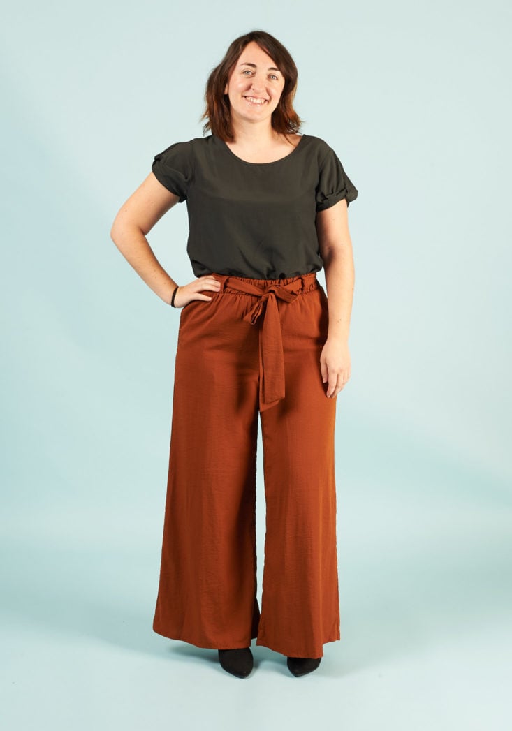 golden tote gray top and brown pants