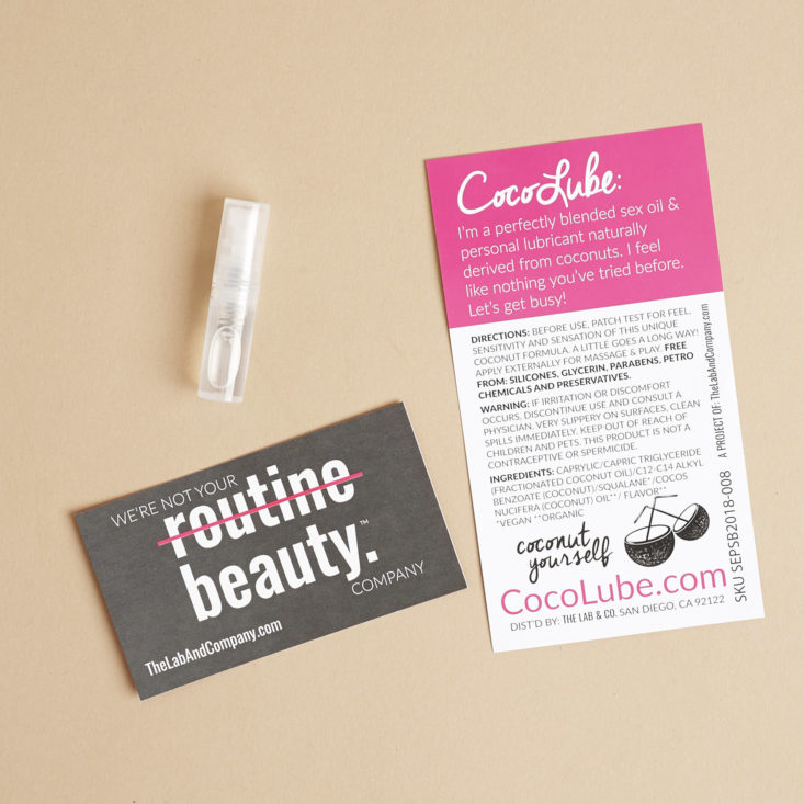 CocoLube Spray & Play Personal Lubricant with back of info card and coupon