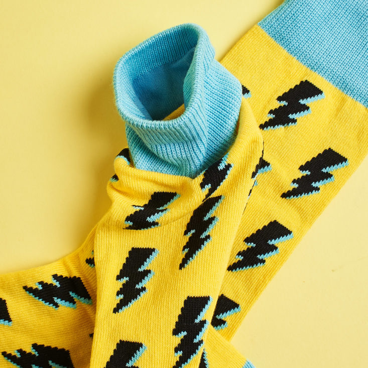 close up of yellow lightning bolt socks