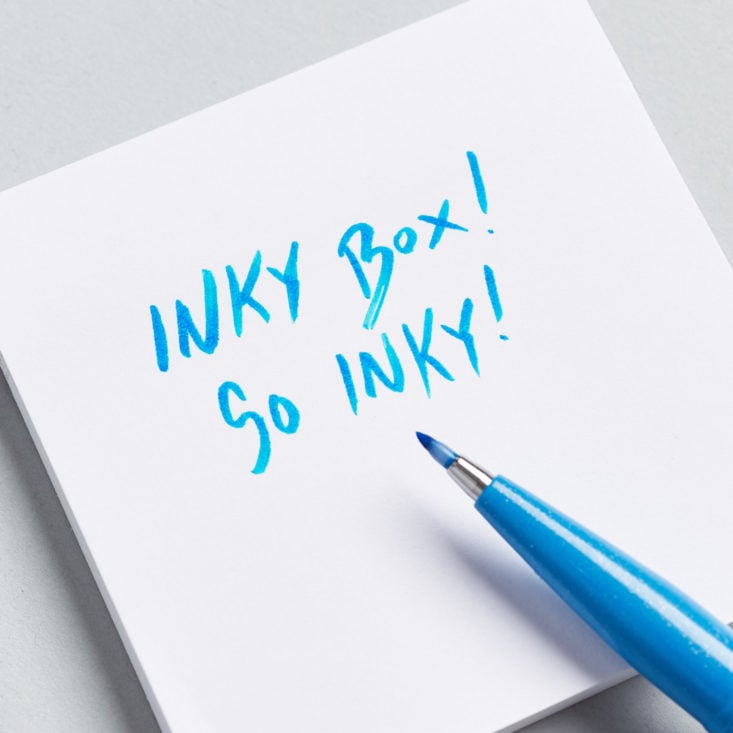 inky box blue felt tip pen on paper