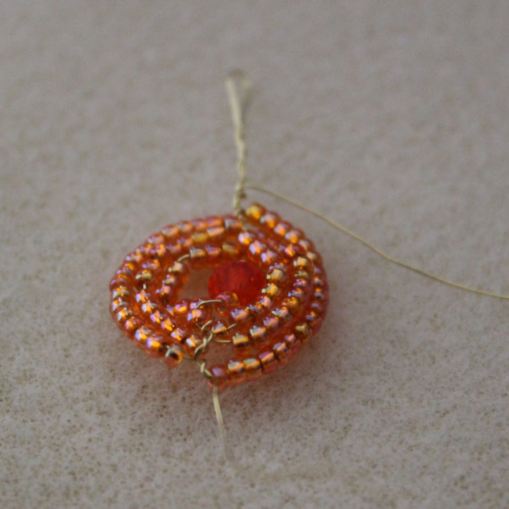 Facet Jewelry Stringing October 2018 - Orange Swirl Earrings Progress Top