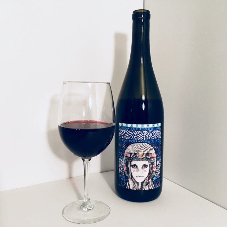 2016 Funk Zone Red Blend wine bottle with wine glass on the left