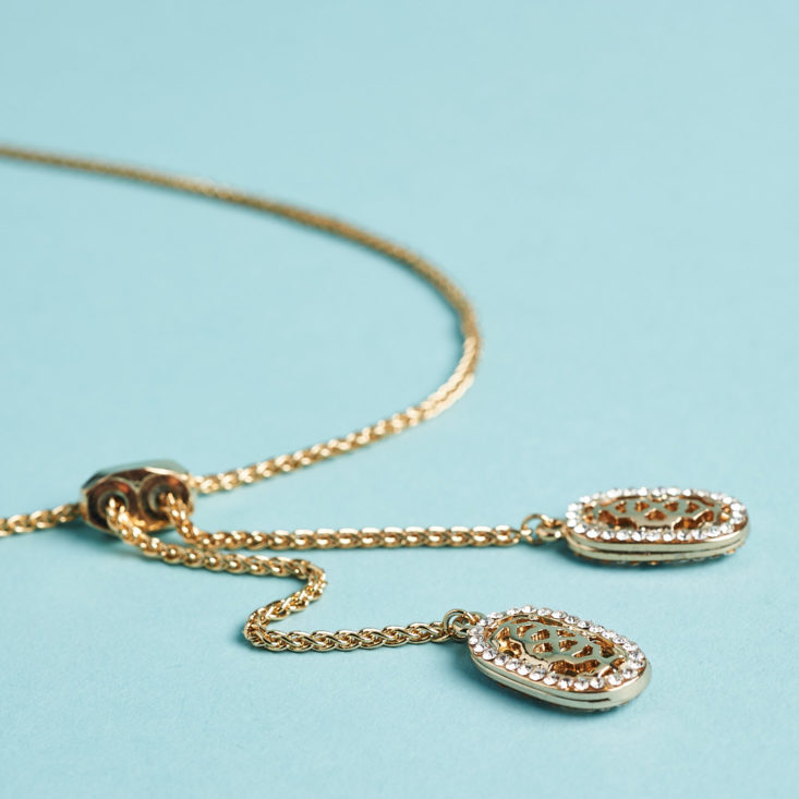 Your Bijoux Box lariat style necklace with charms at end of each chain