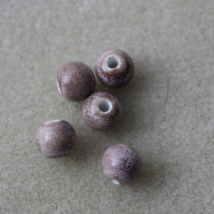 Blueberry Cove Beads December 2018 Box - Round Brown Beads Top