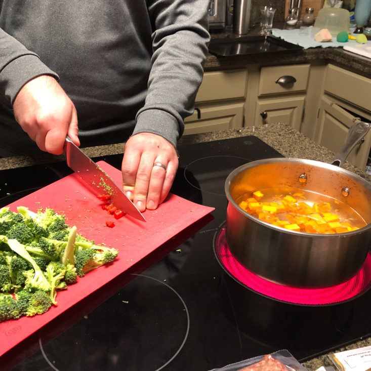 chopping veggies and boiling squash